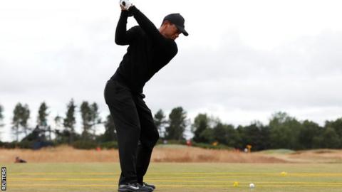 Tiger Woods taking a practice shot at Carnoustie