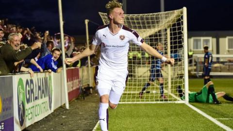 Kevin McHattie celebrates scoring for Hearts