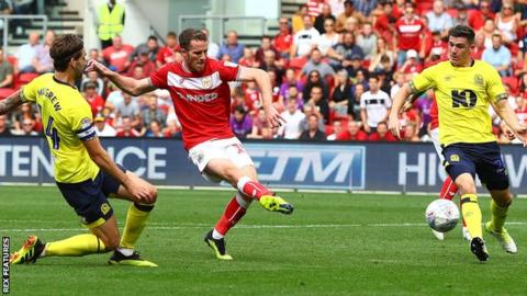 Bristol City's Marley Watkins scores against Blackburn