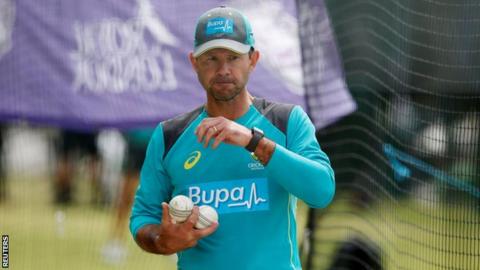 Australia coach Ricky Ponting carries balls at a training session
