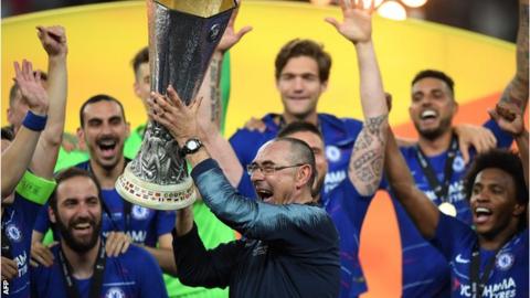 Chelsea head coach Maurizio Sarri lifts the Europa League trophy