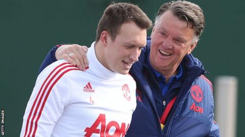 Phil Jones with his Manchester United manager Louis van Gaal