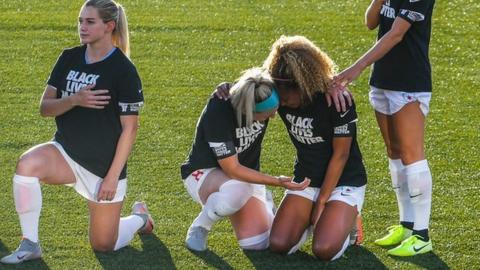 Casey Short (centre right) was embraced by captain Julie Ertz (centre left)