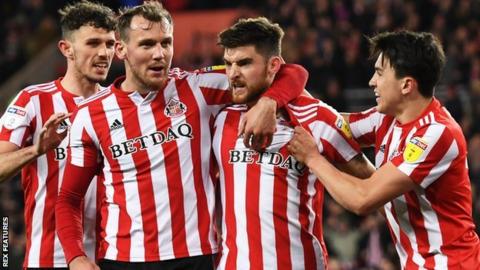 Jack Baldwin's first-half equaliser earned Sunderland a point at home to Burton