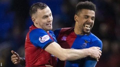 Inverness Caledonian Thistle players Darren McCauley and Nathan Austin celebrate their win over Ross County