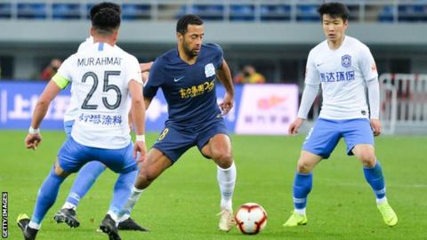 Mousa Dembele in action in China