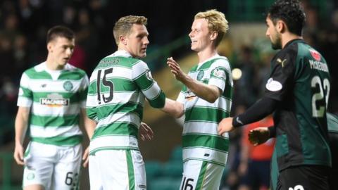 Kris Commons (left) and Gary Mackay-Steven celebrate Celtic's opening goal