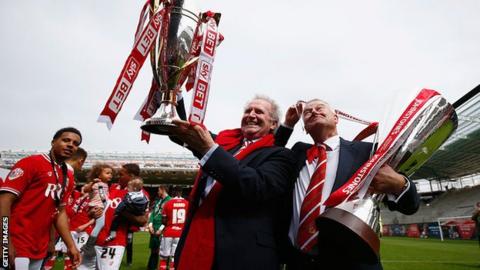 Bristol City owner Steve Lansdown (right) and Chairman Keith Dawe celebrate their League One title and EFL Trophy double