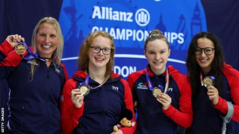 Great Britain's Stephanie Millward, Brock Whiston, Toni Shaw and Alice Tai pose with their gold medals after winning the women's 4x100m freestyle relay