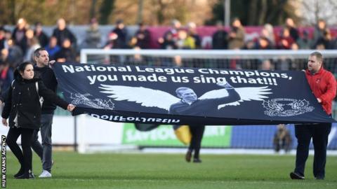 Leyton Orient fans pay tribute to Justin Edinburgh at Newport County
