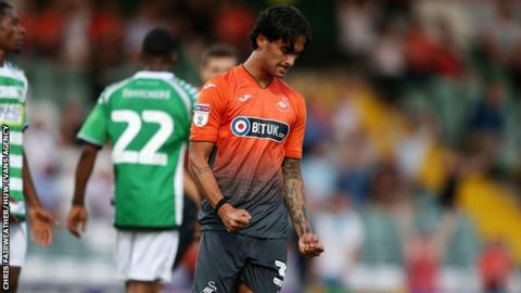 Yan Dmanda of Swansea City celebrates scoring a goal