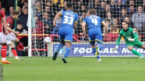 Shaun Miller scores a penalty