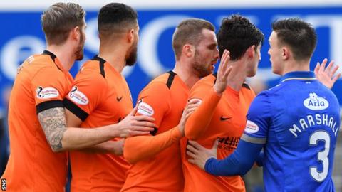 Queen of the South's Jordan Marshall keeps a watch on Dundee United's Frederic Frans, Rachid Bouhenna, Pavol Safrenko and Ian Harkes