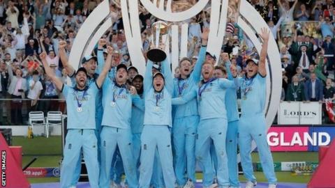 England captain Eoin Morgan holds the World Cup trophy aloft