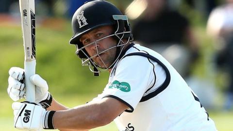Jonathan Trott's 137th first-class half-century helped him go past 12,000 runs for Warwickshire