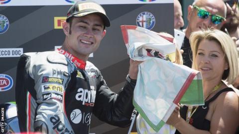 Leon Haslam celebrates his podium finish in Misano