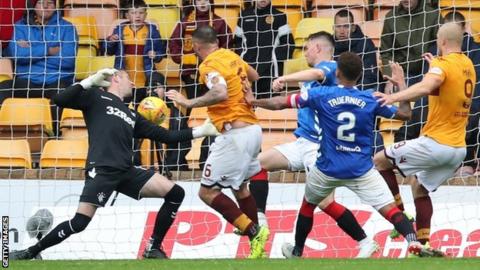 Peter Hartley taps home in injury time for Motherwell to make it 3-3 against Rangers