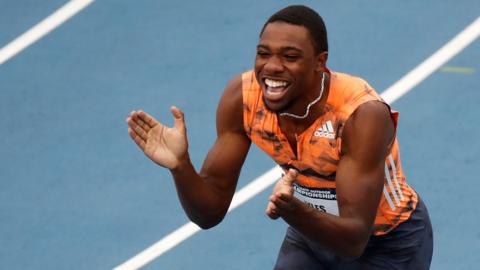 Noah Lyles celebrates his win