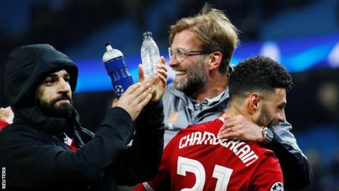 Jurgen Klopp (centre) celebrates