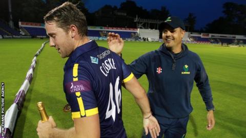 Chris Cooke is congratulated by Glamorgan captain Jacques Rudolph