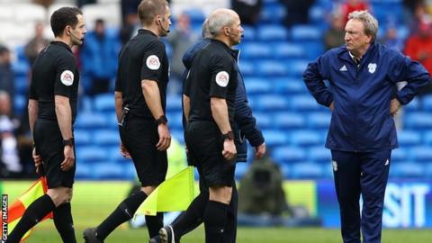 Neil Warnock and referee face off