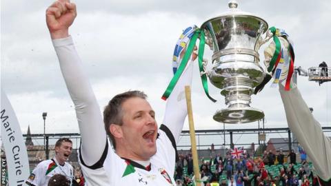 Colin Nixon lifts the Irish Cup after Glentoran's victory over Cliftonville in the 2013 final
