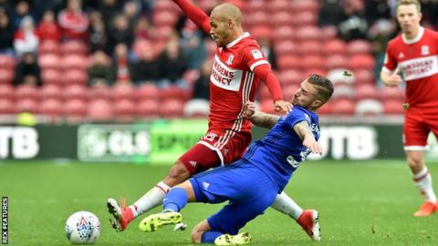 Cardiff City's Joe Bennett tackles Martin Braithwaite