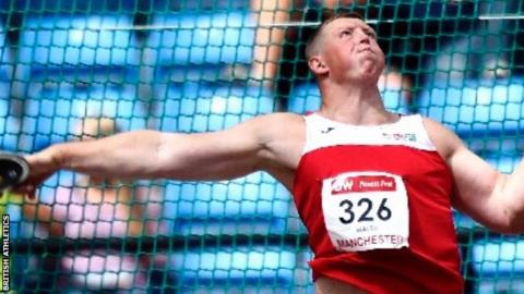 Harrison Walsh throws the discus