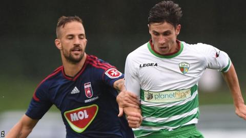 New Saints' Aeron Edwards in action against Videoton