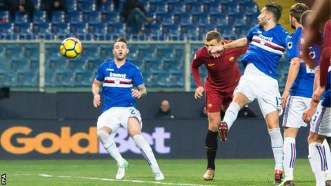 Edin Dzeko heads Roma's equaliser against Sampdoria