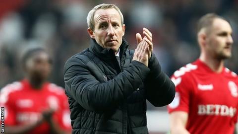 Charlton caretaker manager Lee Bowyer applauds fans after a game