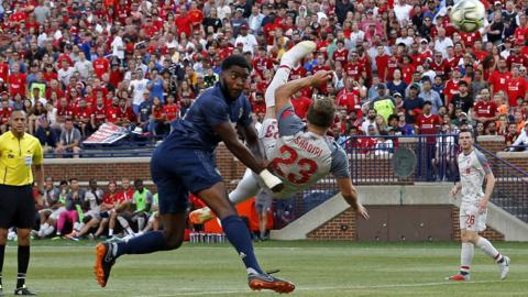 Michigan, United States, 28 July: Liverpool's Xherdan Shaqiri scores an overhead kick during the second half of the International Champions Cup football match against Manchester United at Michigan Stadium in Ann Arbor. (Photo by Jeff Kowalsky/AFP/Getty Images)