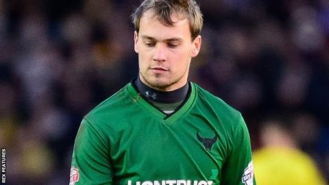 Oxford United goalkeeper Sam Slocombe