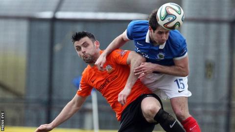 Glenavon's Eoin Bradley and Linfield's Sean Ward in action last season