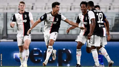Cristiano Ronaldo celebrates scoring with his Juventus team-mates