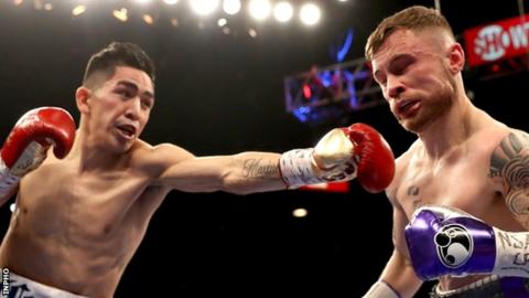 Leo Santa Cruz battles with Carl Frampton during their January 2017 bout in Las Vegas