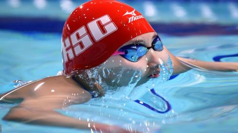 Ako Iida of Japan competes during the women's 100m breaststroke heats on day two of the Japan Swim at the Tokyo Tatsumi International Swimming Center