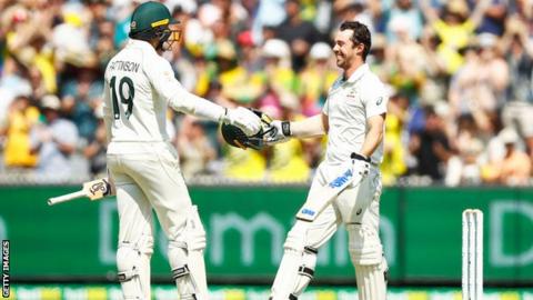 Travis Head celebrates his second Test century