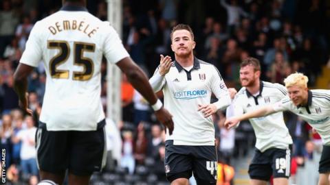 Ross McCormack celebrates with Moussa Dembele
