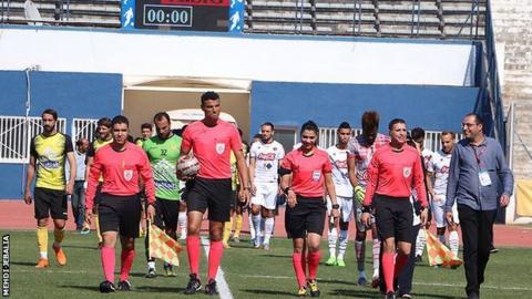 Dorsaf Ganouati (second right) walks out with her fellow officials at a Tunisian Ligue 1 match