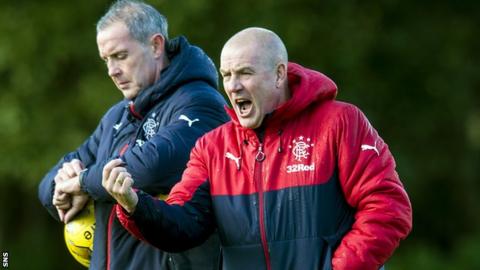 Rangers assistant David Weir and manager Mark Warburton at training