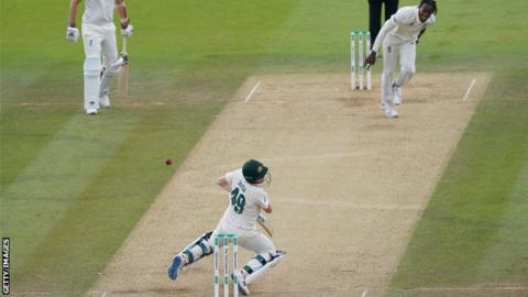 Steve Smith is struck on the neck by a Jofra Archer bouncer during the second Test at Lord's
