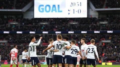 Tottenham celebrate scoring against Stoke