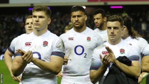 England rugby players Owen Farrell, Nathan Hughes and George Ford look dejected after defeat by Scotland