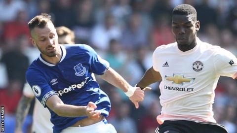 Morgan Schneiderlin challenges Paul Pogba