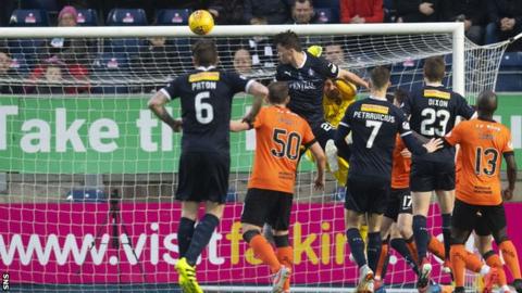 Ciaran McKenna scores