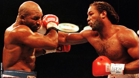 Lennox Lewis (right) beat Evander Holyfield in 1999