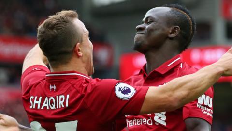 Xherdan Shaqiri and Sadio Mane celebrate