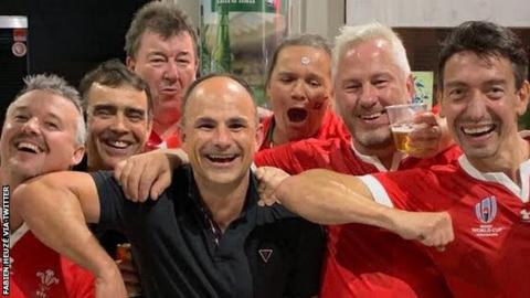 Jaco Peyper poses with Wales fans