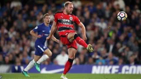Laurent Depoitre scores for Huddersfield against Chelsea